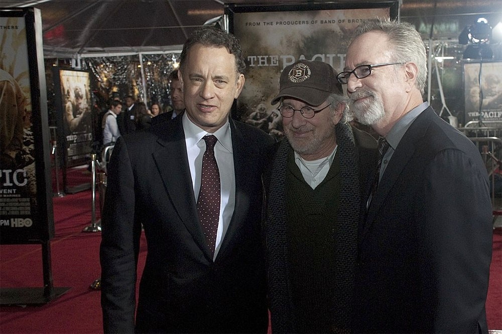Executive Producers Steven Spielberg, Tom Hanks and Gary Goetzman pose for pictures on the red carpet at HBO's Hollywood premiere for 'The Pacific' at Grauman's Chinese Theater 24 Feb 2010. Wikimedia Commons.