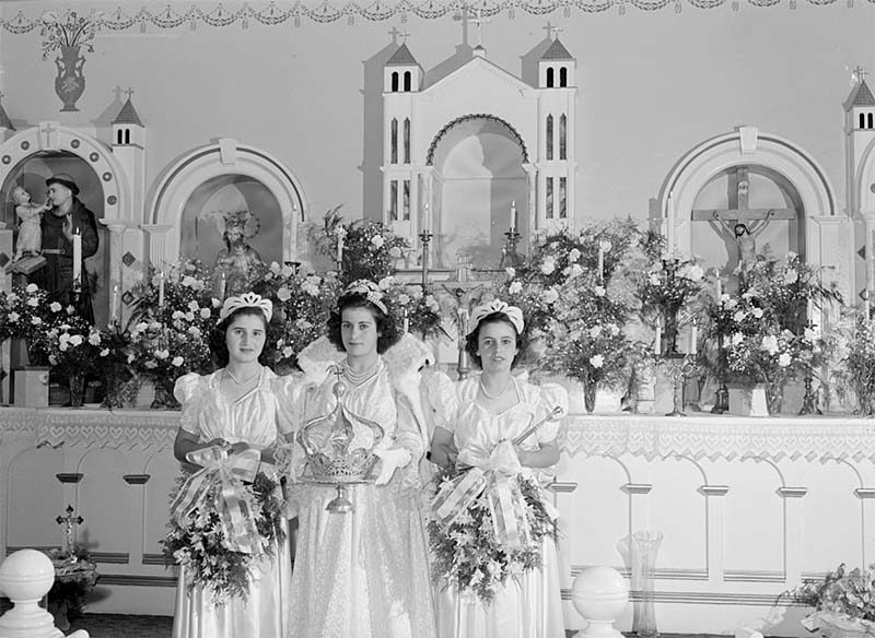 Queen Geraldine Vierra and her maids Margaret Freitas and Lillian Tabash of the fiesta of the Holy Ghost,  Sociedade do Espirito Santo (SES) hall, Portuguese-American society, Santa Clara, California, 1942, Library of Congress