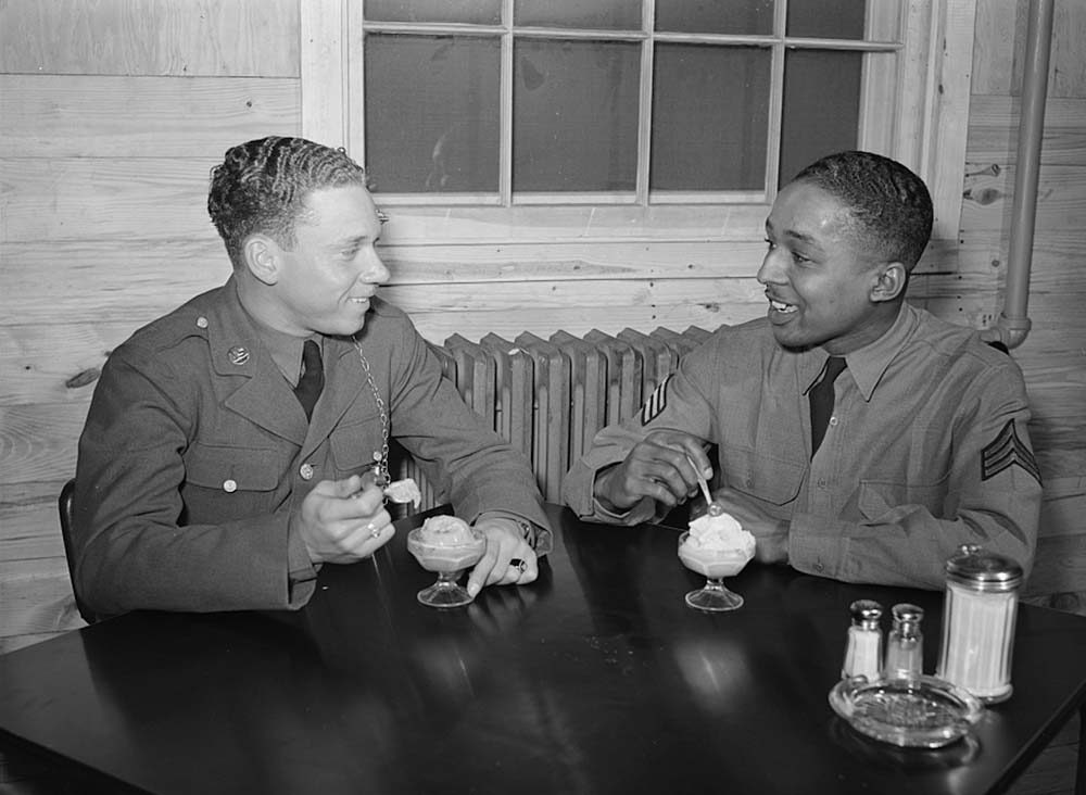 Fort Bragg, North Carolina,  Sergeant Williams eating ice-cream with a friend