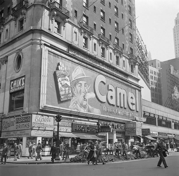 Billboard with real smoke for cigarette brand Camel in Times Square, 1948, Wikimedia Commons