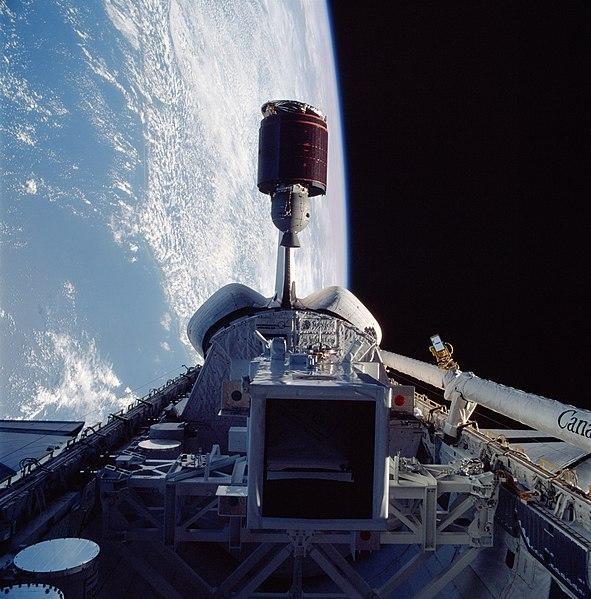Telstar 3-D communications satellite deploying from Discovery's payload bay, 1985, Wikimedia Commons