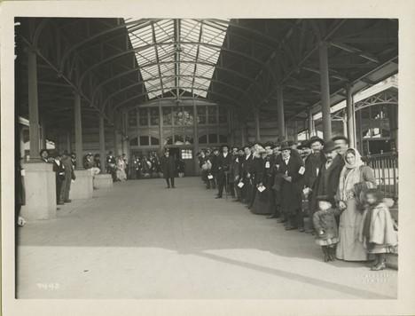 Passed and waiting to be taken off Ellis Island, 1902-1913, Wikimedia Commons