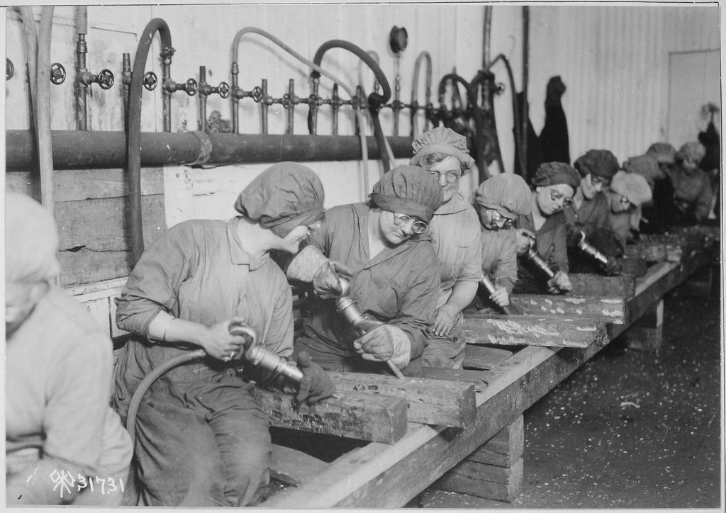 Women workers in ordnance shops, Midvale Steel and Ordnance Company, Nicetown, Pennsylvania. Hand chipping with pneumati, 1918, U.S. National Archives and Records Administration