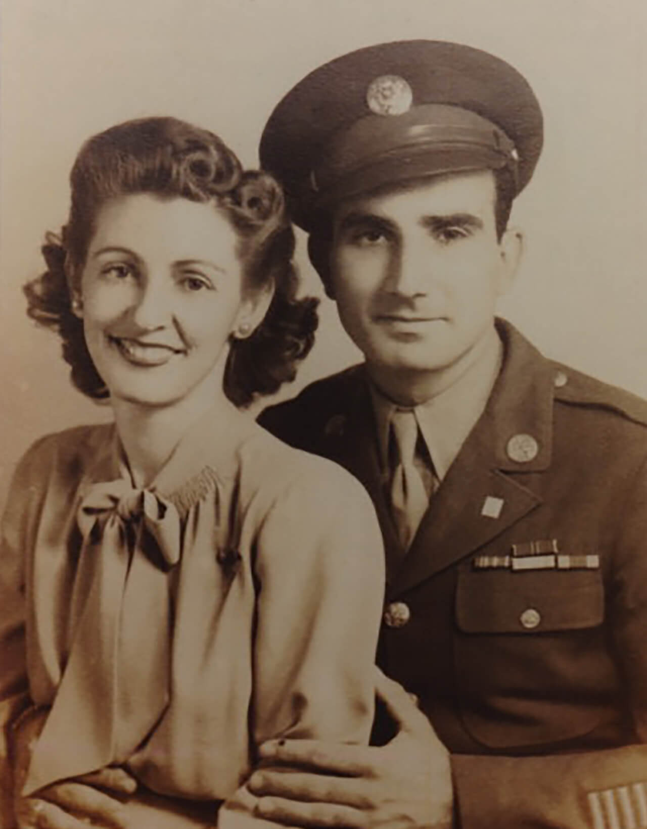Elner Mae and Edmond Nicholas in uniform.