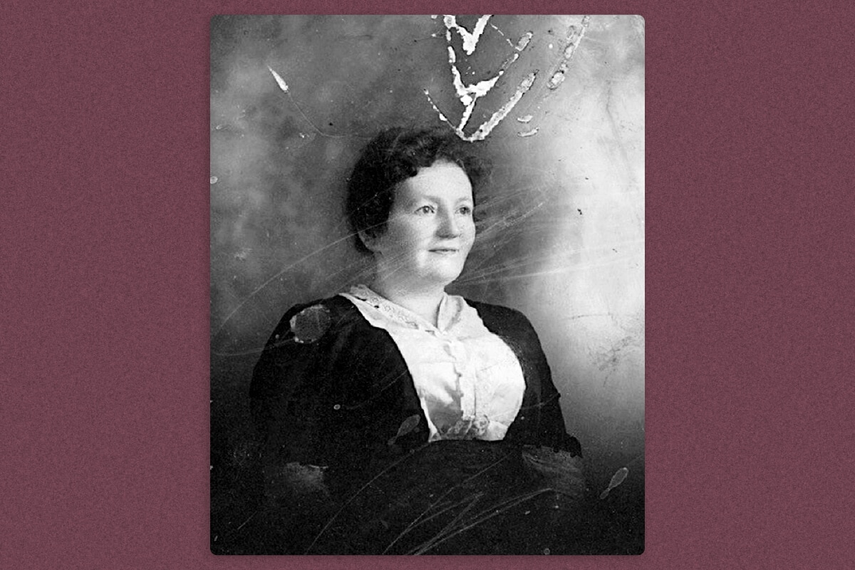 A portrait of a half-smiling woman, Ester, taken at a side angle