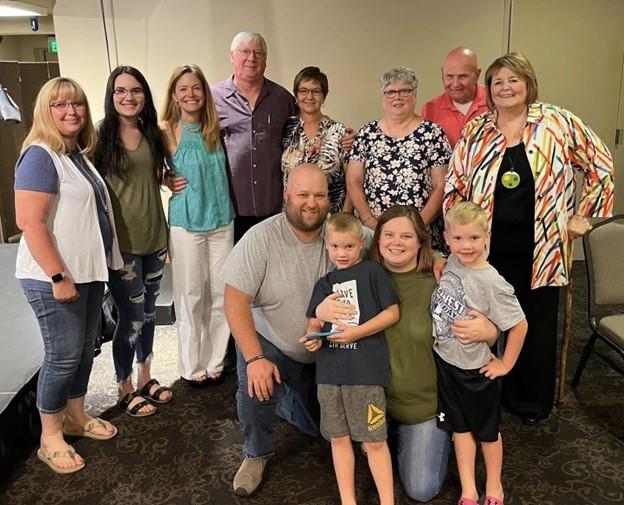  The authors posing with cousins who traveled to see the play.