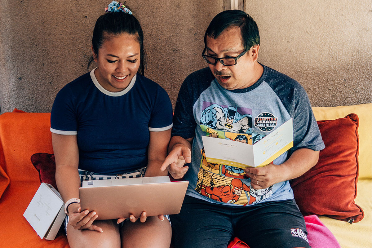 Father and daughter reviewing DNA results.